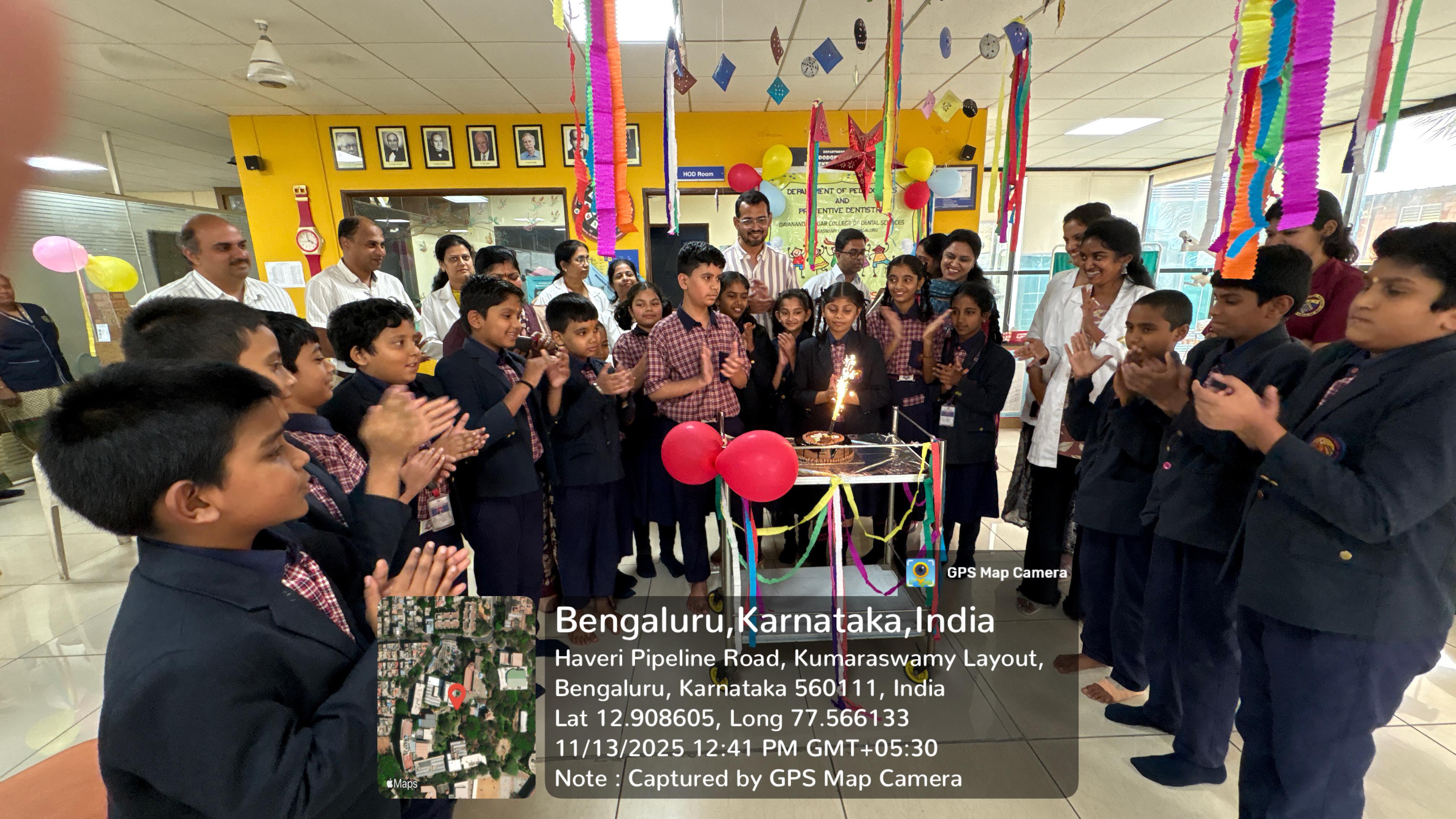 Students and faculty celebrating with sparklers during the event